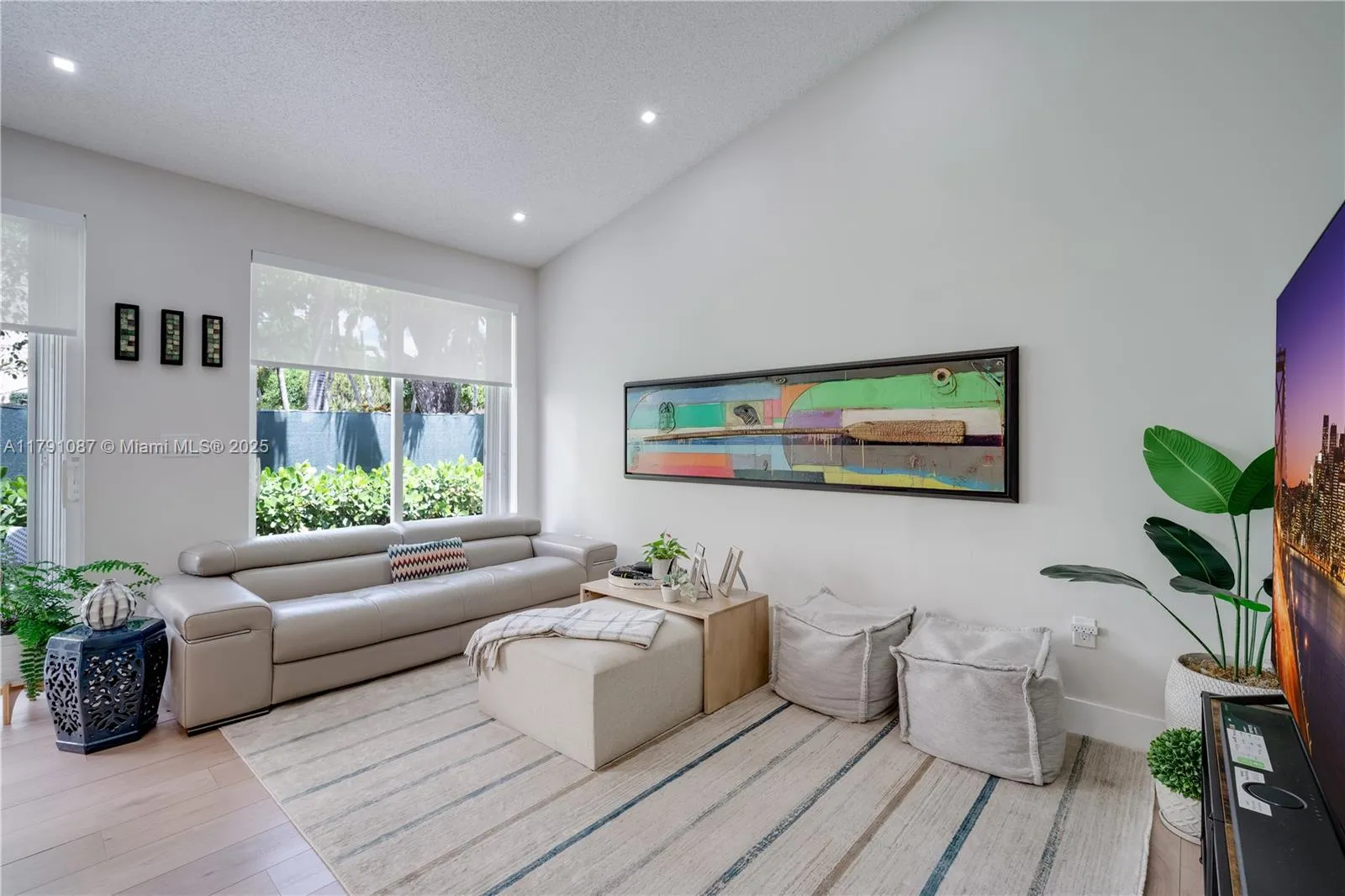 Family room with high ceilings * lots of natural lighting *