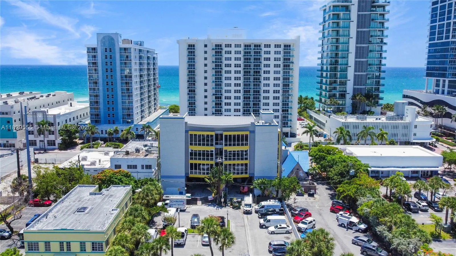 City of Miami Parking lot at 6933 Harding Ave adjacent to building on west.  Park and walk up to elevator lobby.