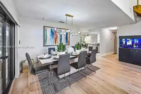 Sleek dining space where contemporary meets tropical vibes!