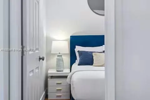 Intimate bedroom retreat with navy nautical vibes!