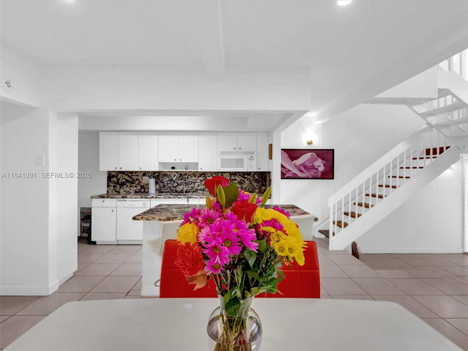 Wood cabinets and granite counters.