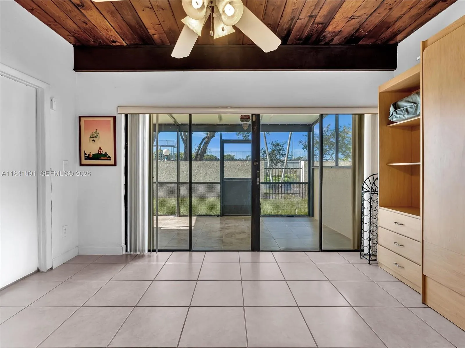 Third Bedroom Located downstairs. Opens to back enclosed back patio