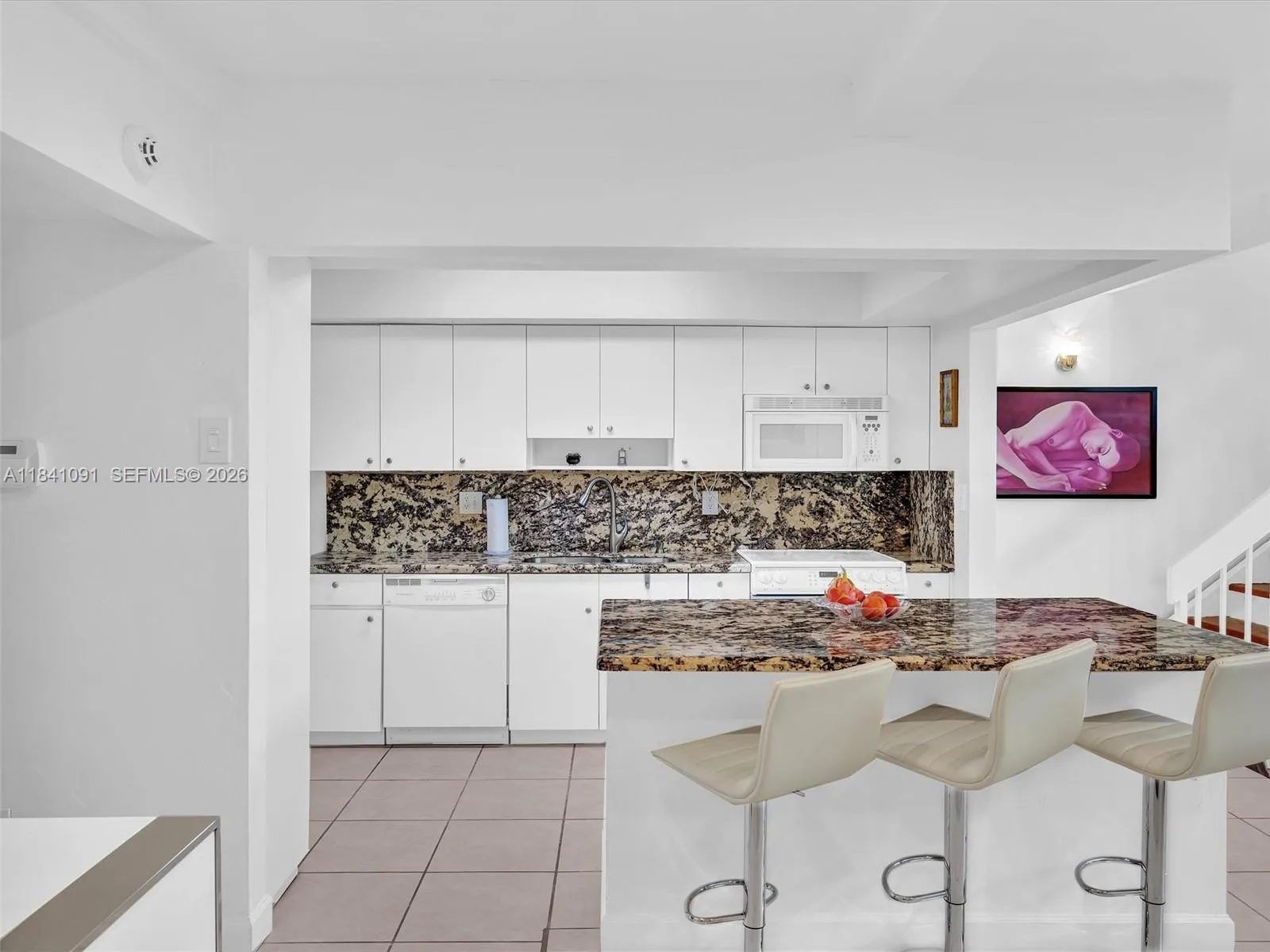 Wood cabinets and granite counters.