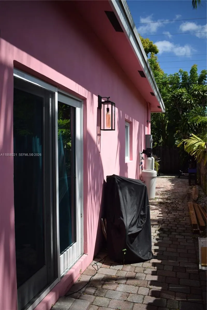 Side walkway provides convenient access to the backyard without passing through the interior.