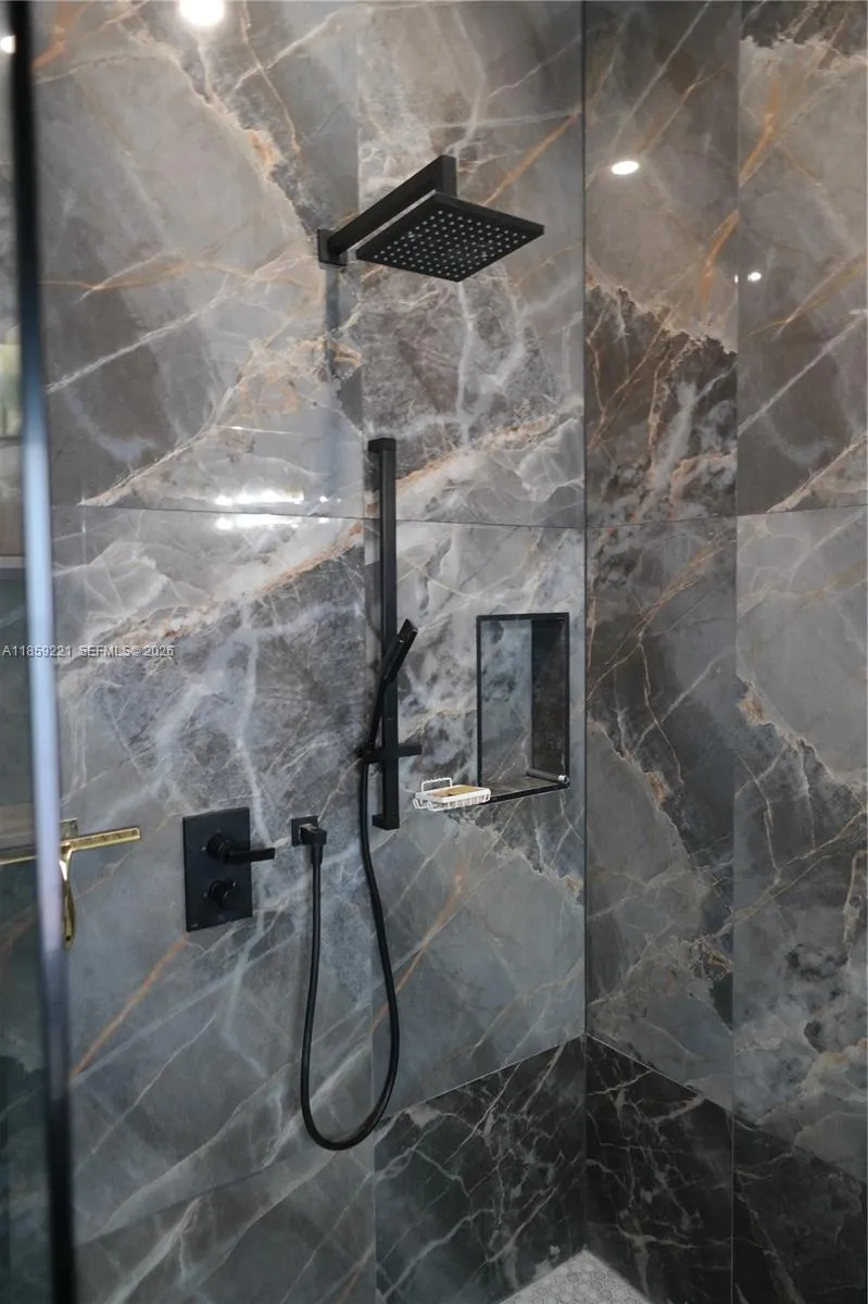 Thoughtfully selected bathroom features offer a spa-like experience, combining functionality with refined comfort