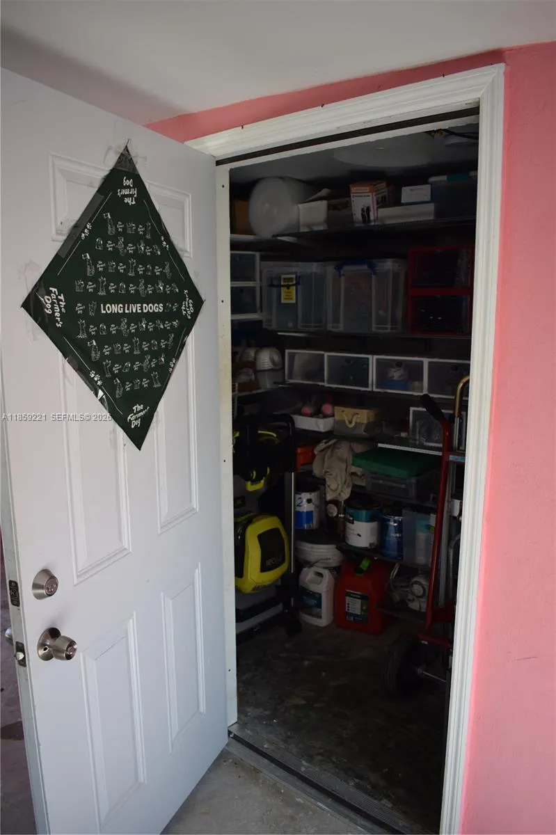 Includes extra storage space for added convenience and organization, just across from carport.