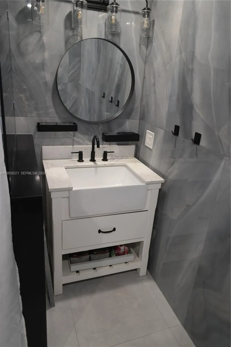 Bathrooms feature beautiful, modern deep sinks that elevate the space with clean lines and stylish finishes.