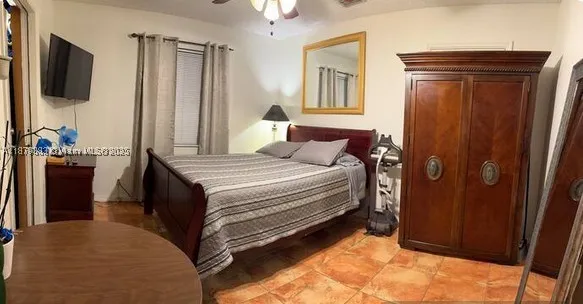 Living area with queen bed