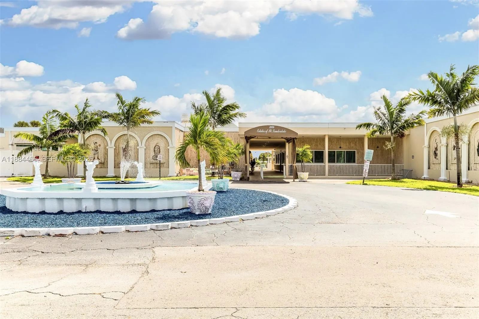 Estates of Ft. Lauderdale Clubhouse Entrance. Low HOA fee $115/monthly