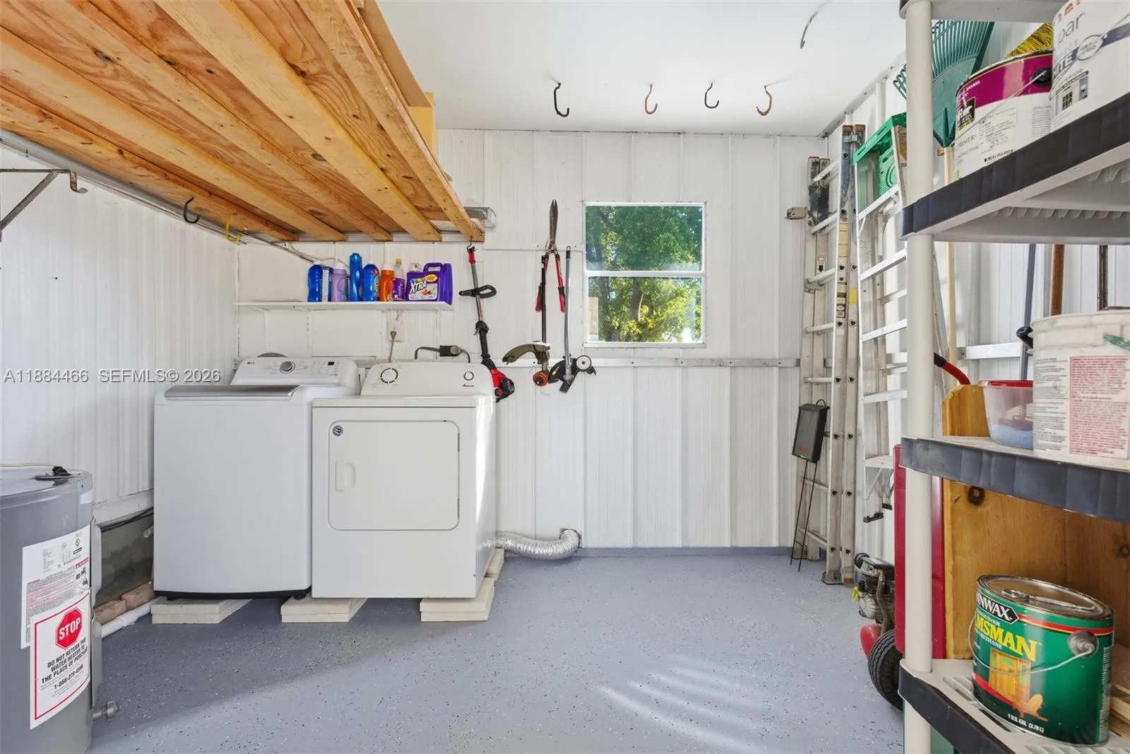 Freshly painted shed with epoxy speckled floor paint. New LG Washing Machine. Water Heater 2021