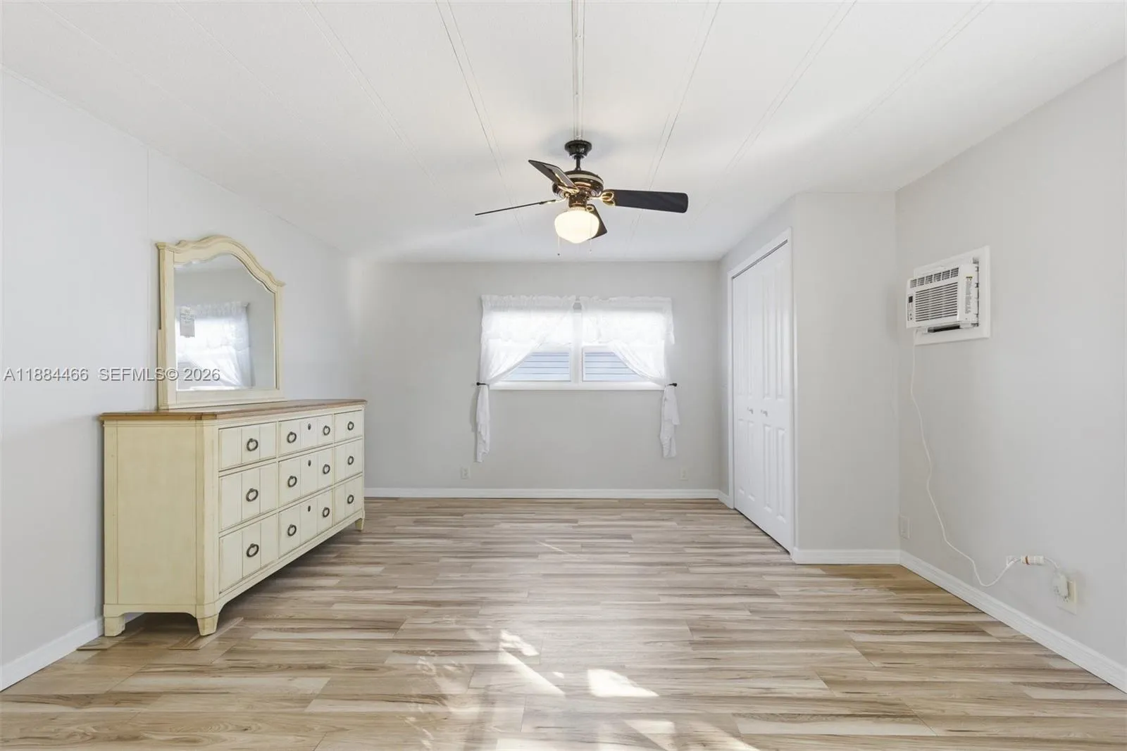 Guest/In-Law suite bedroom area. Space has Central A/C but also has an additional new A/C wall unit incase needed.
