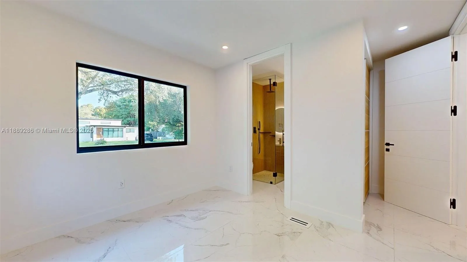 4th Bedroom, in the front of the house, SE corner, with on-suite bathroom
