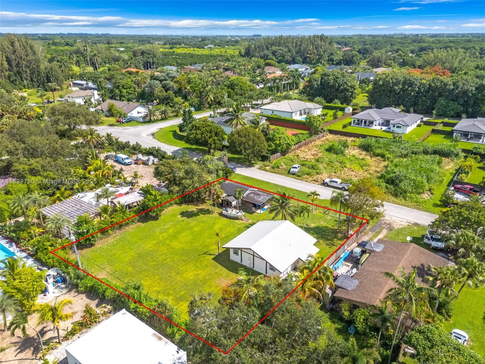 THE REAR AERIAL VIEW OF THE 1/4 ACRE. ROOM FOR A POOL. BRING YOUR CHICKENS! PLANT SOME FRUIT TREE\'S