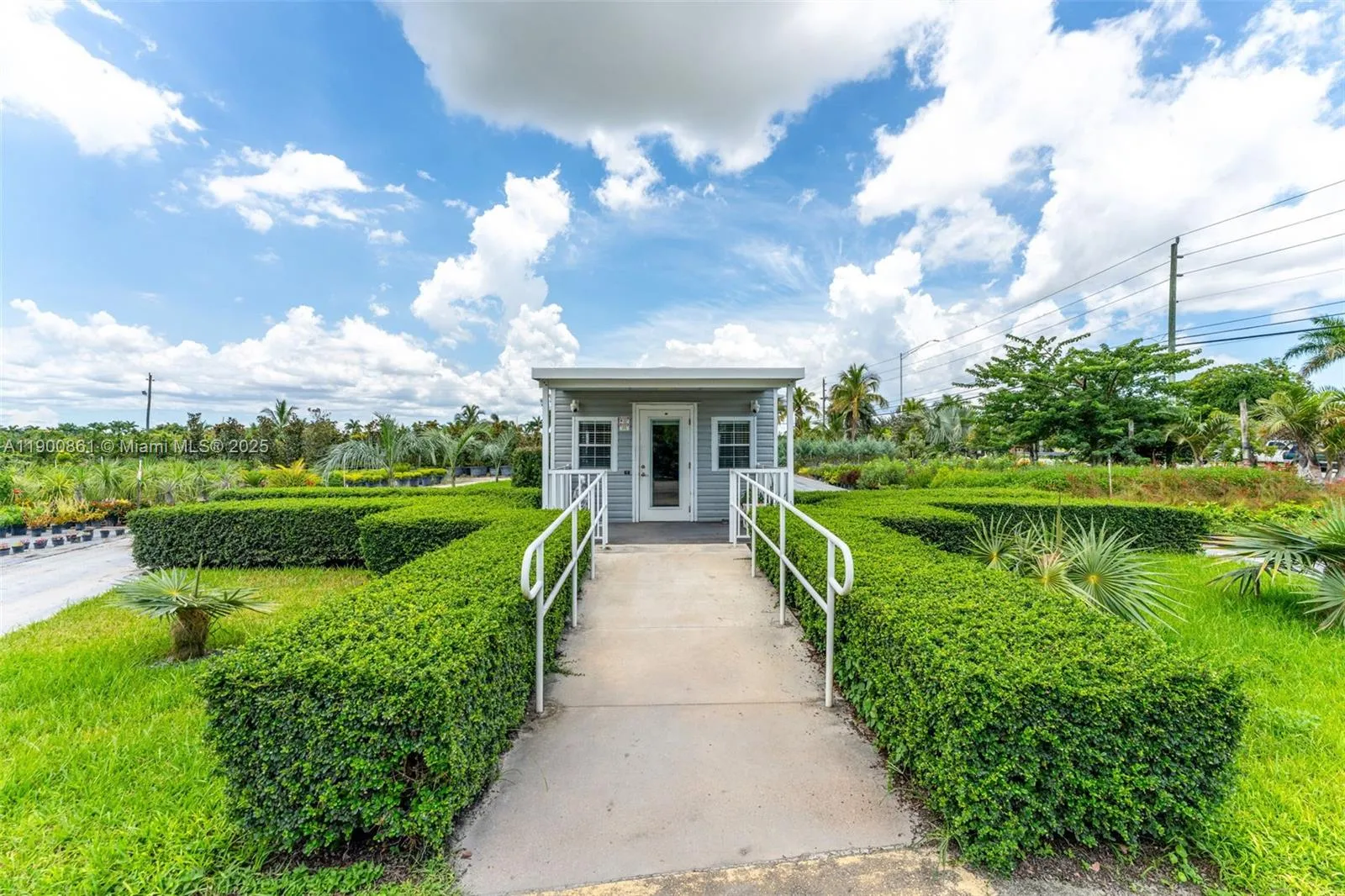 FRONT ENTRANCE TO THE AIR CONDITIONED OFFICE