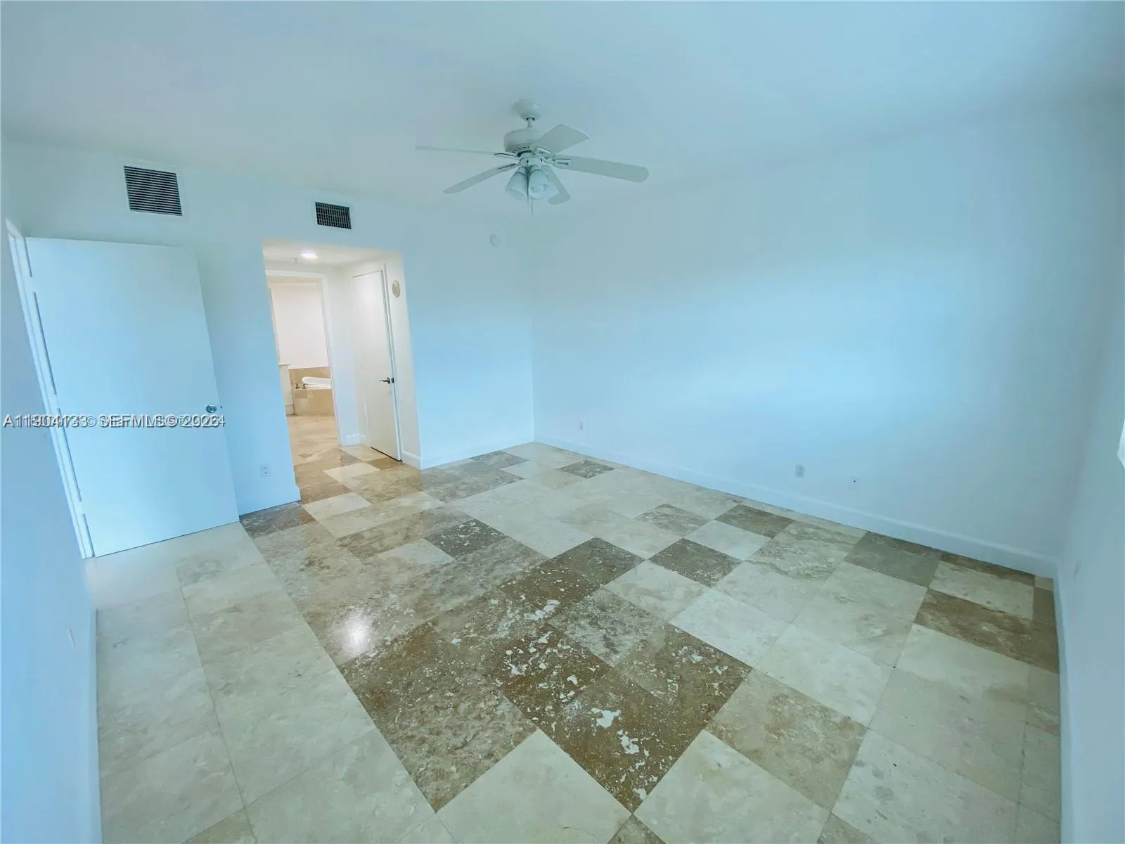 Master bedroom with 2 huge walk in closets and en suite bathroom