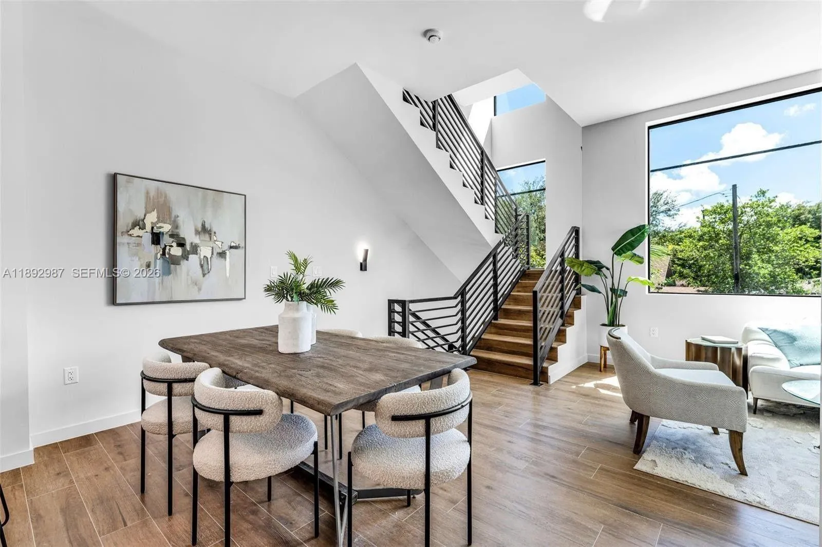 OPEN FLOOR PLAN CAN BE SET UP IN MULTIPLE WAYS. BREAKFAST BAR KITCHEN.