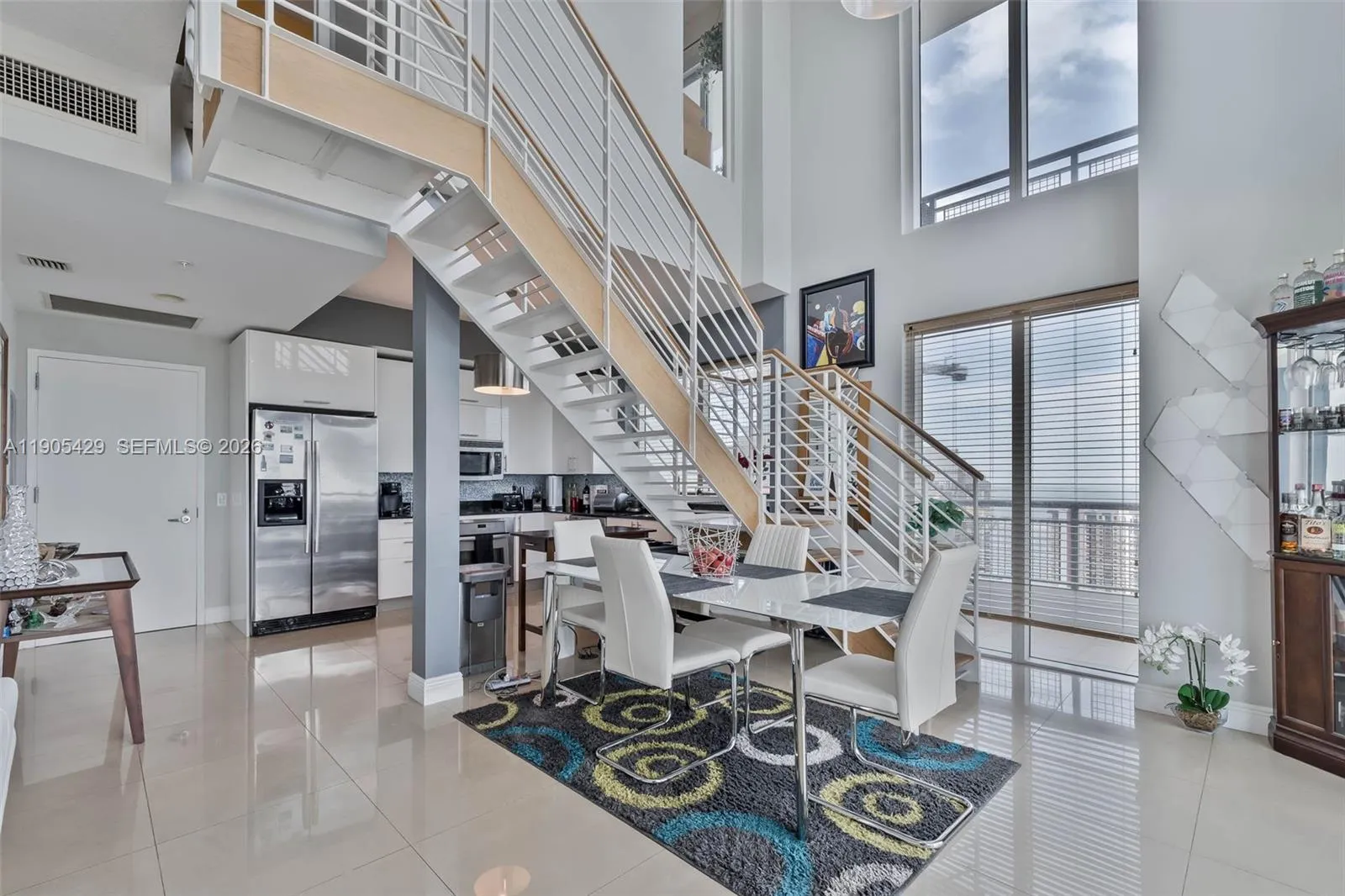 Two story loft unit. The desirable \"01\" line of the Infinity building.