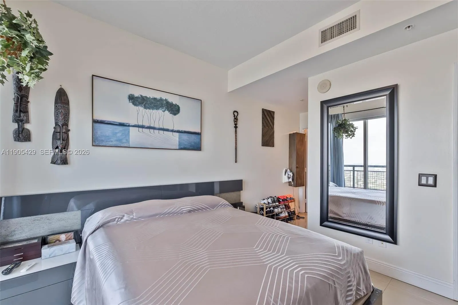 Two bedrooms upstairs. Two balconies, one above the other.