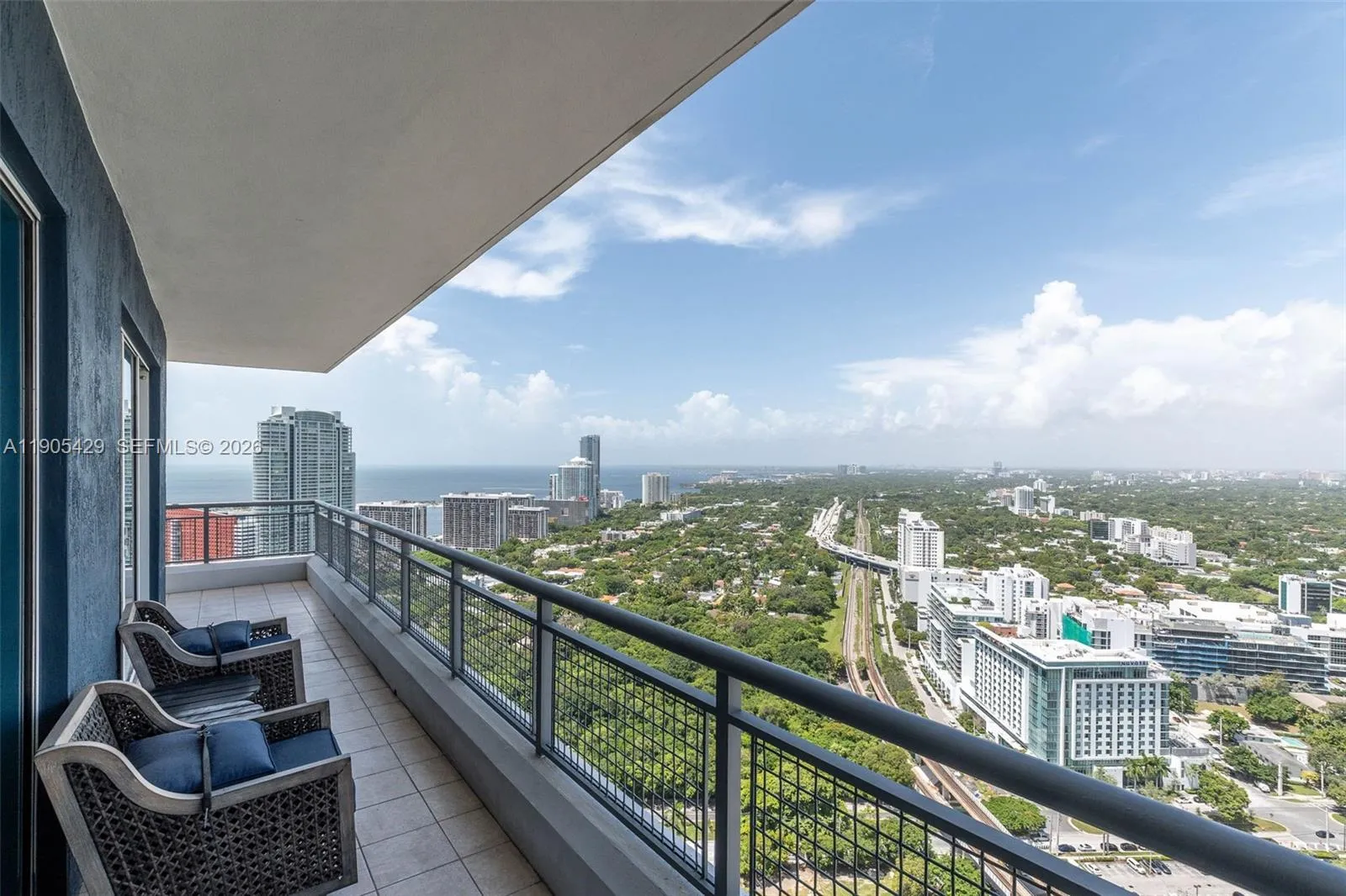 Two level apt. Miami\'s great views. 2 large balconies. Corner unit.