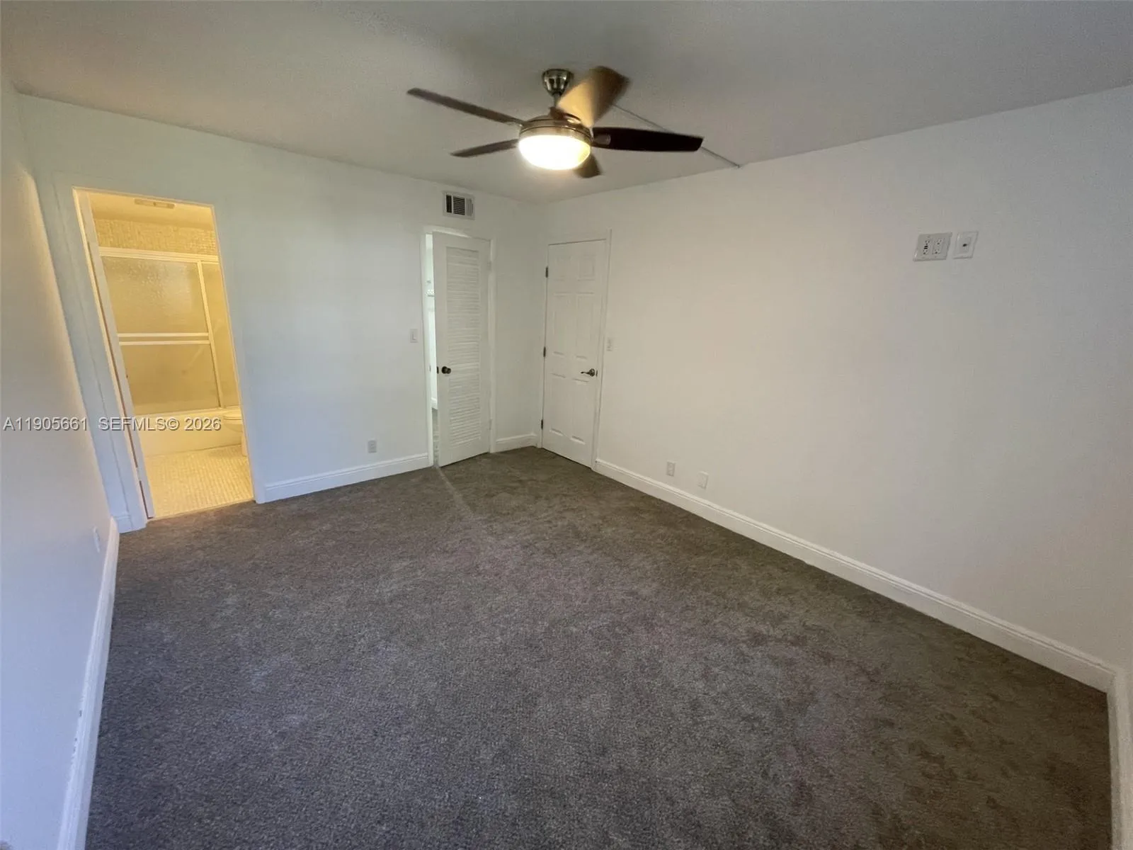 Master Bedroom with Dimmable Lighting.