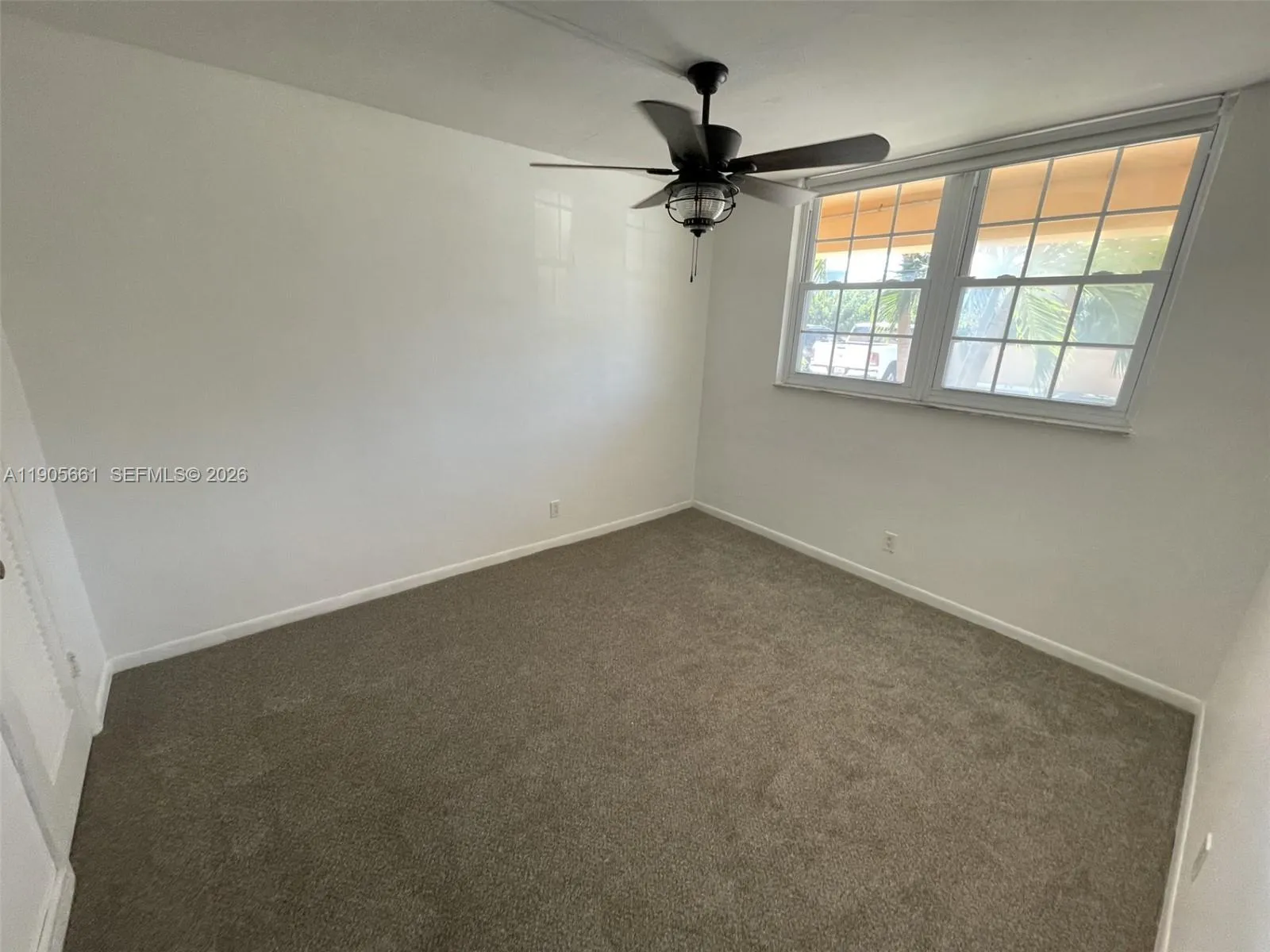 2nd Bedroom with Front\'s View and Ceiling Fan with Dimmable Lighting.
