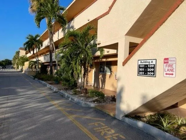 Condominium exterior, Assigned parking space directly in front of the unit.
