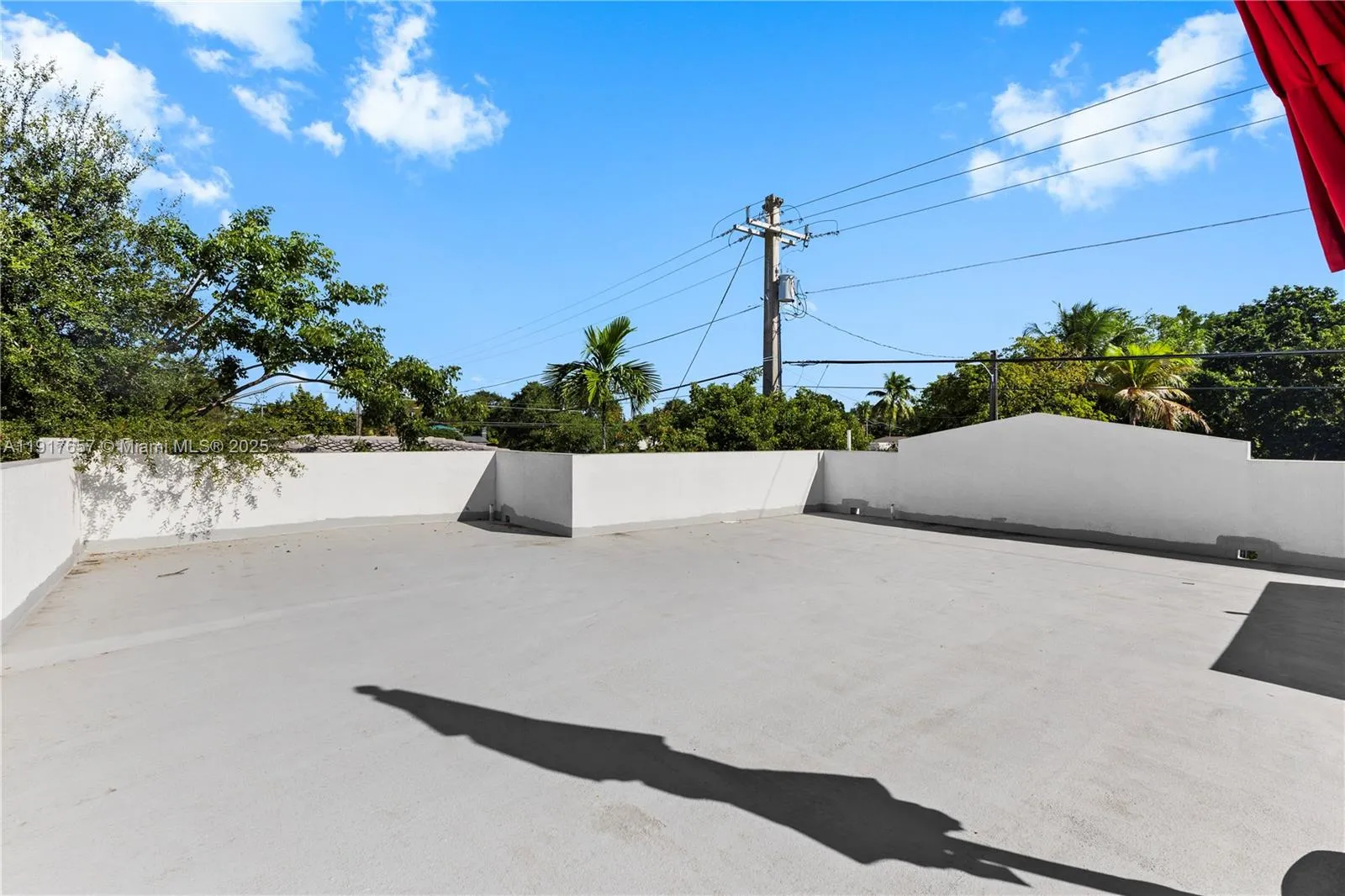 Roof patio area above 5820 NW 3rd Ave