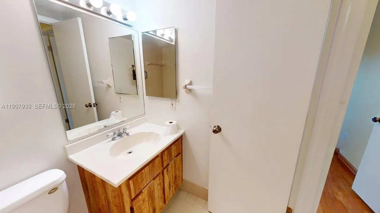 Crisp and inviting bathrooms showcasing clean lines, updated vanities, and a soothing atmosphere throughout.