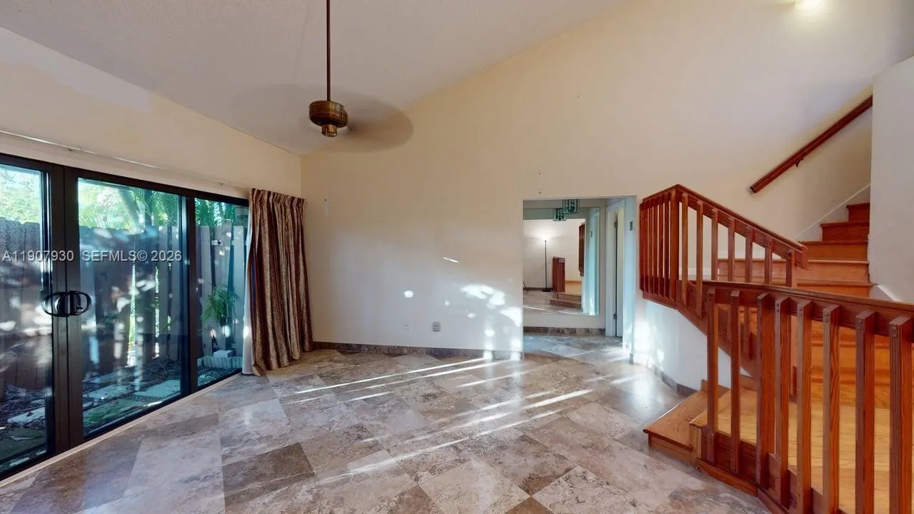 Inviting dining space with warm designer flooring and open concept layout ideal for entertaining or family gatherings