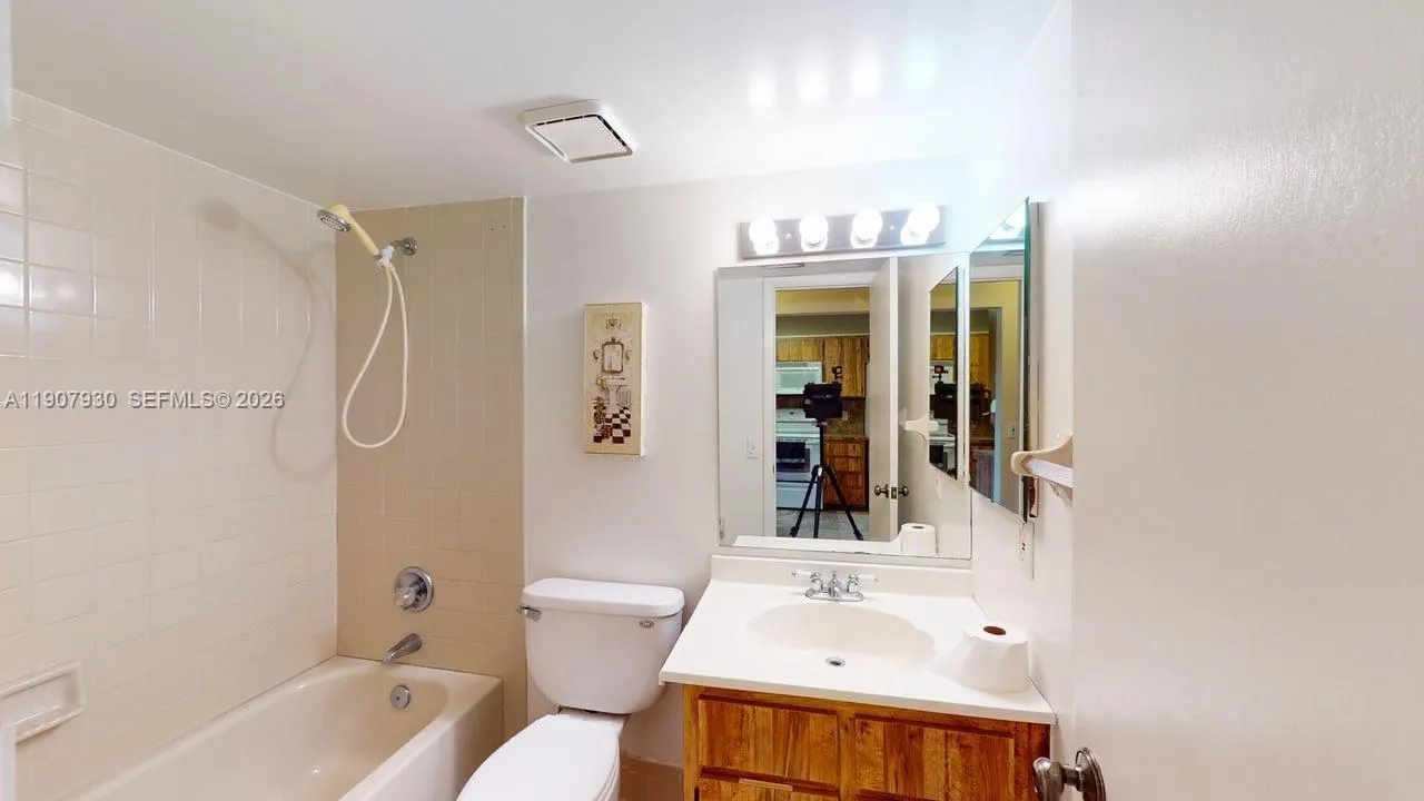 Crisp and inviting bathrooms showcasing clean lines, updated vanities, and a soothing atmosphere throughout.