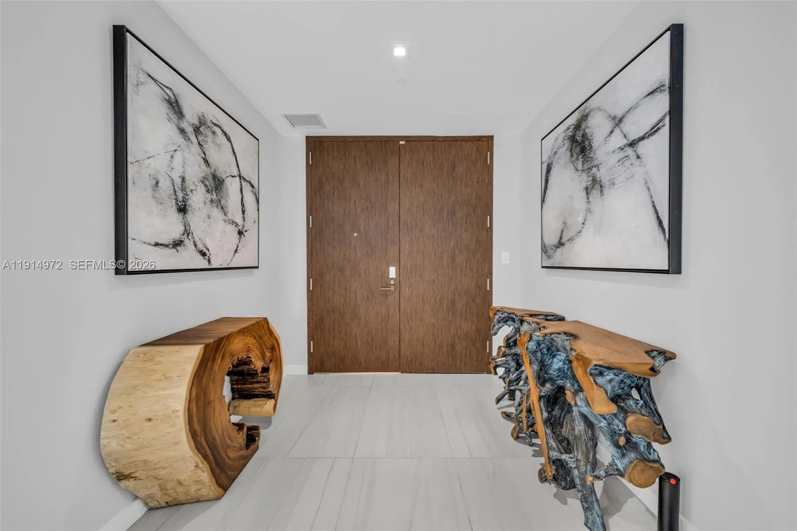 Private Elevator Foyer with cusdtom entry doors