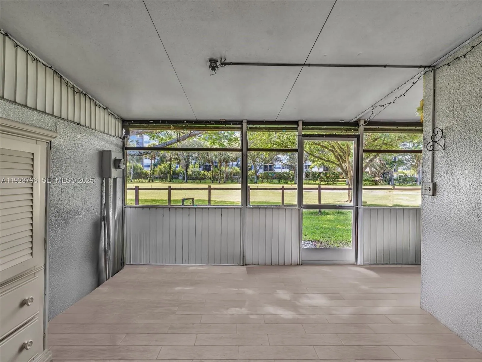 Screened Enclosed Patio, Expands the living area and opens to the Golf Course.