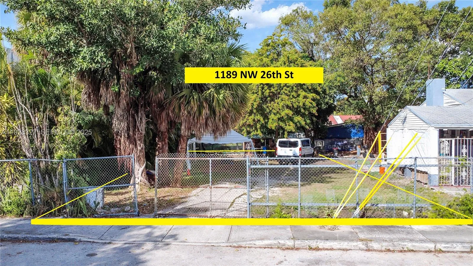 50 front feet and 100 feet deep.  Existing curb cut