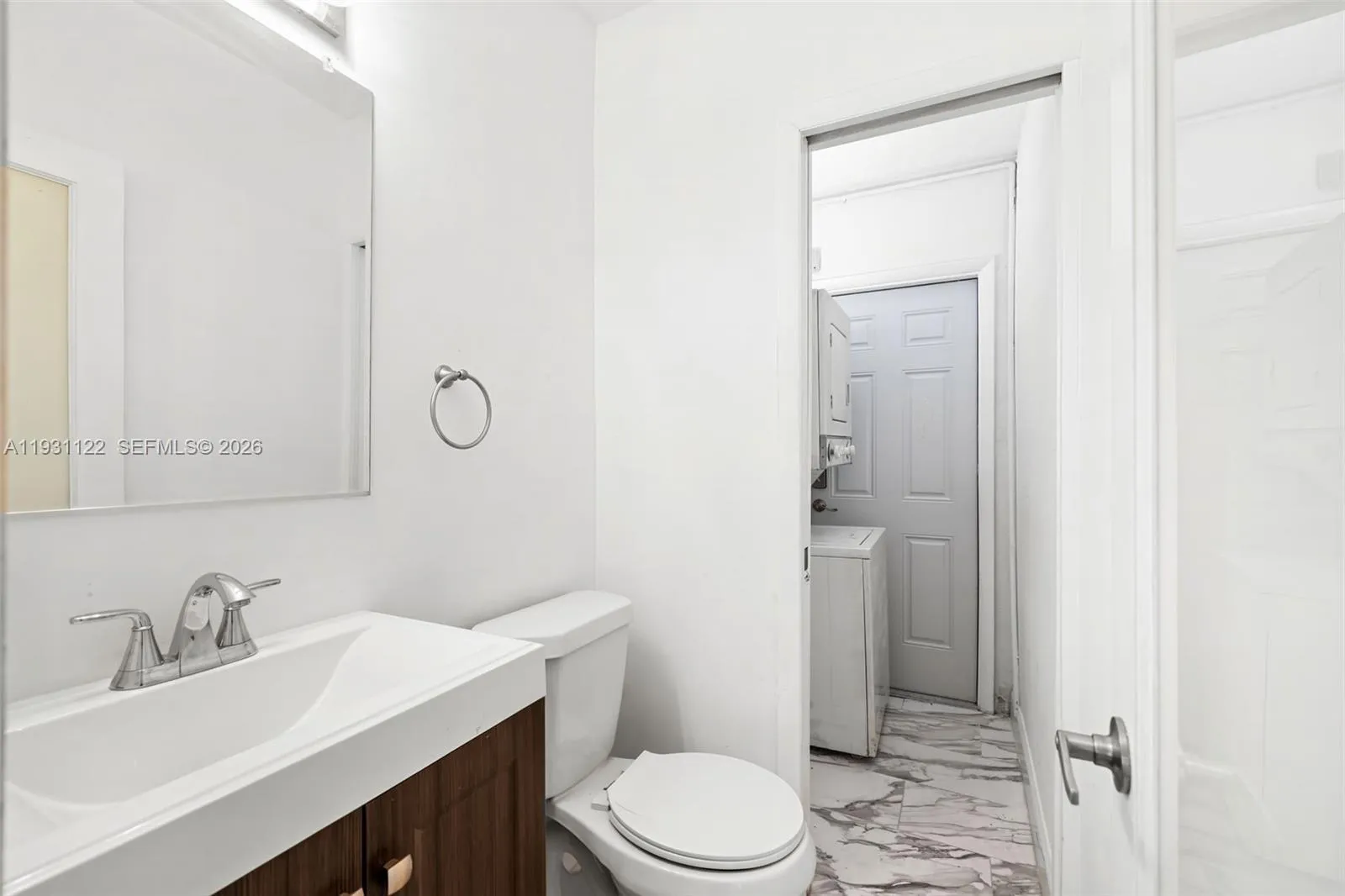 Half Bath / Washer and Dryer (located on main floor of home)