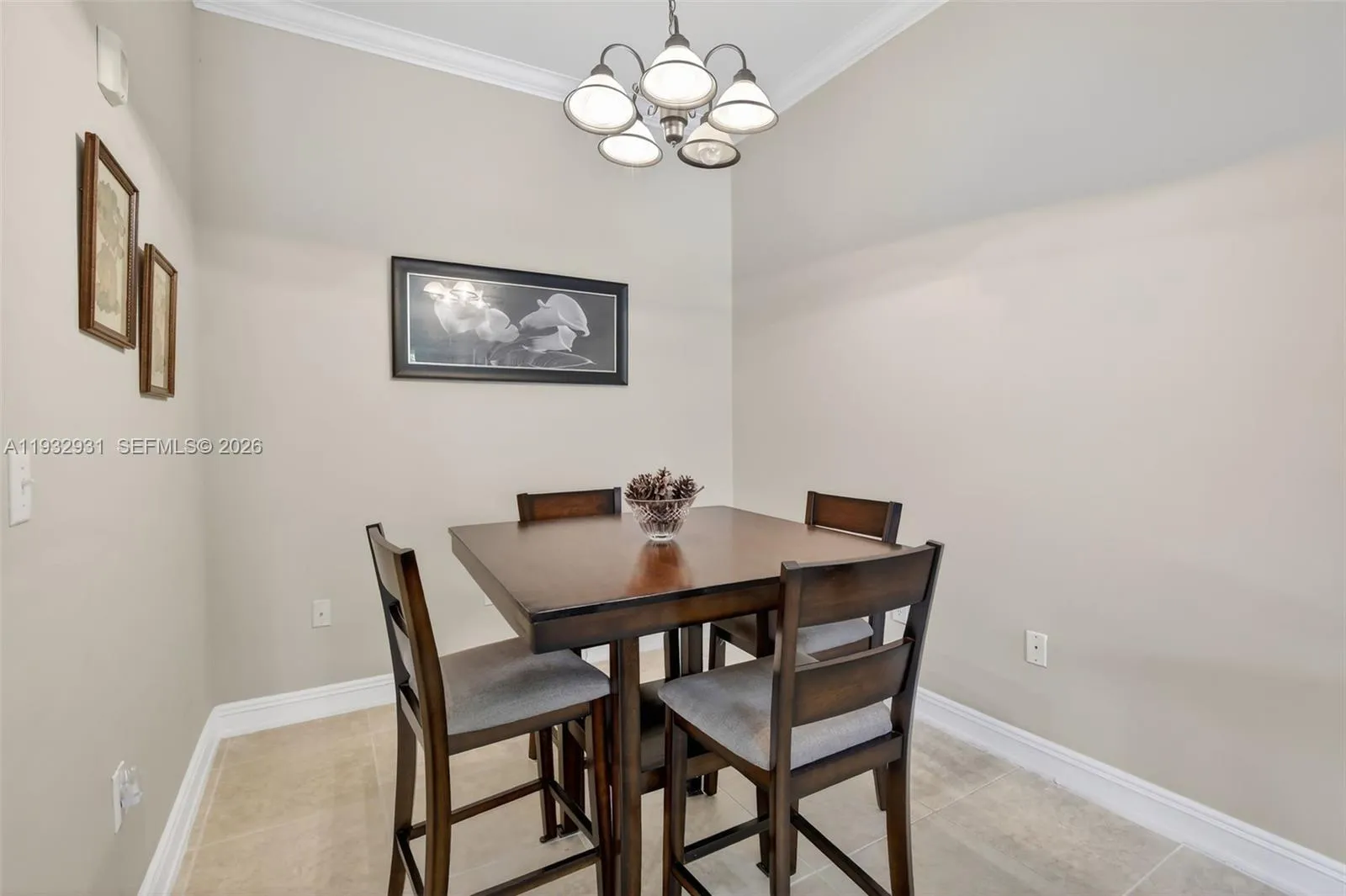 Cozy dining area can accommodate larger table and more seating if needed.