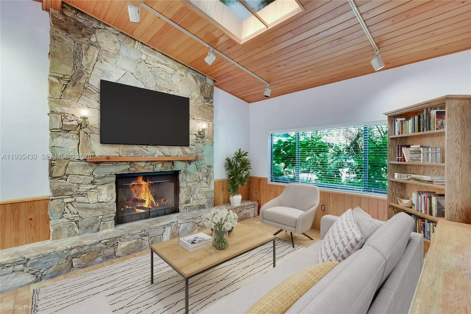 Family Room With Wood Burning Fireplace (Virtually Staged)