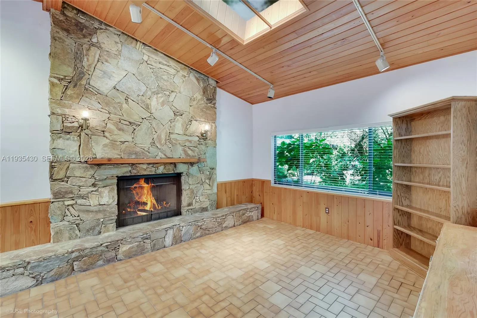 Family Room With Wood Burning Fireplace