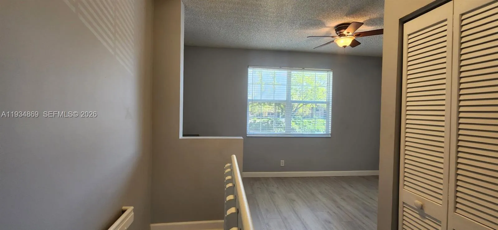 Stairs to den/office and master bedroom