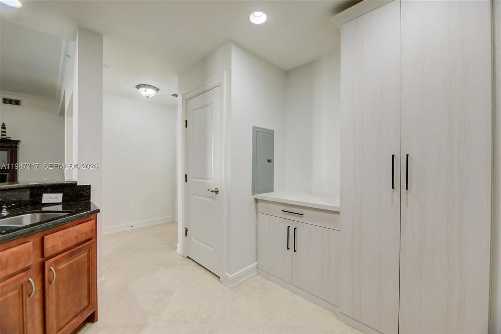 Custom Built-In Pantry and Laundry Storage