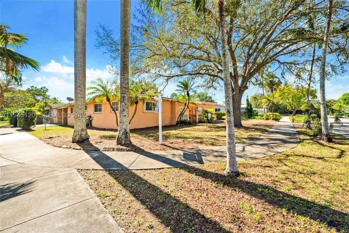 Great corner location with access from SW 57 Ave and 45 Terr.  Very large home with very large lot which is ready to live  or expand according to your needs.