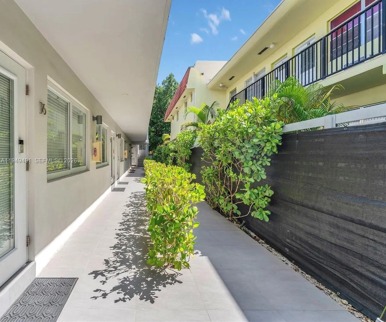 Walkway. Well maintained, private entrance in the premier Flamingo Lummus neighborhood.
