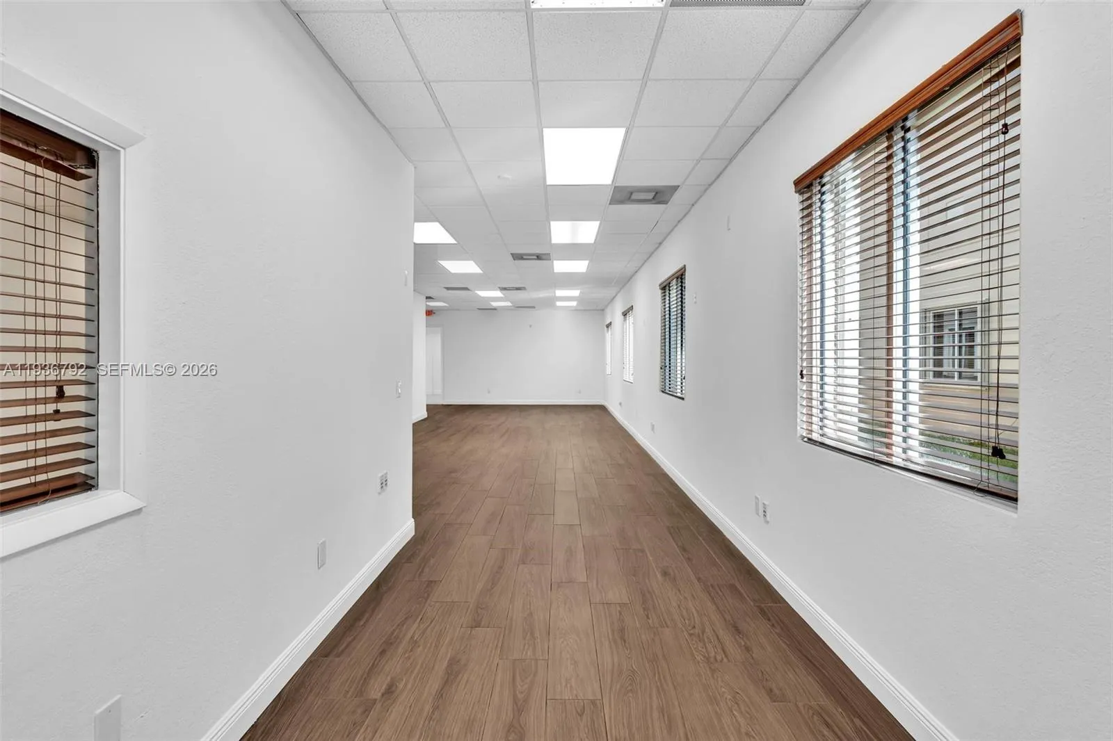 can be closed off as an office, break room, file room, etc..