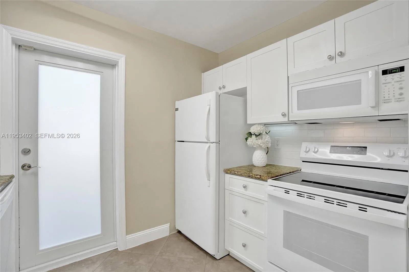 (1429) #2  -Hurricane impact door opens to private enclosed backyard. Door is behind private gate.