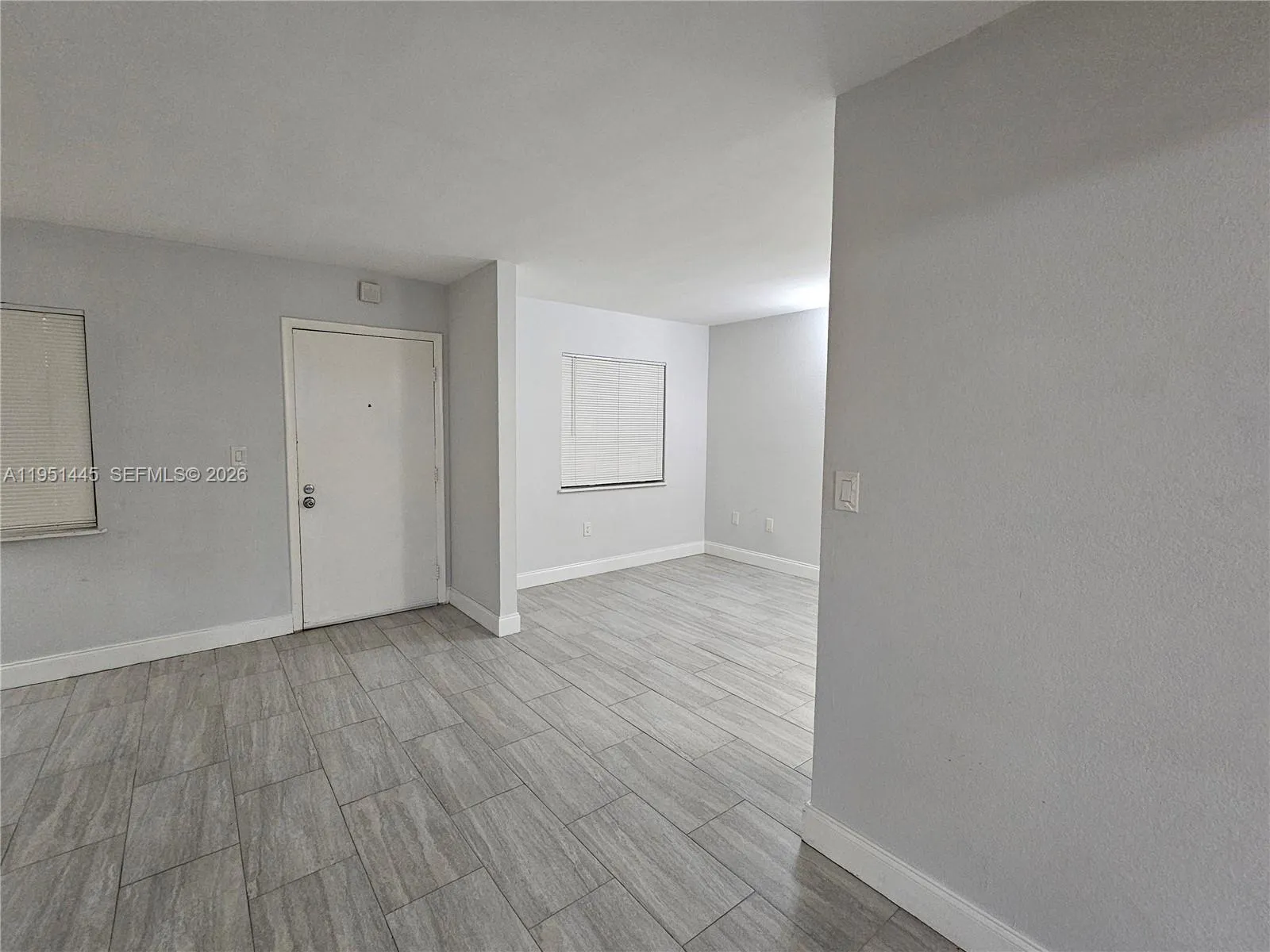 View of Front Door & Entrance to Den