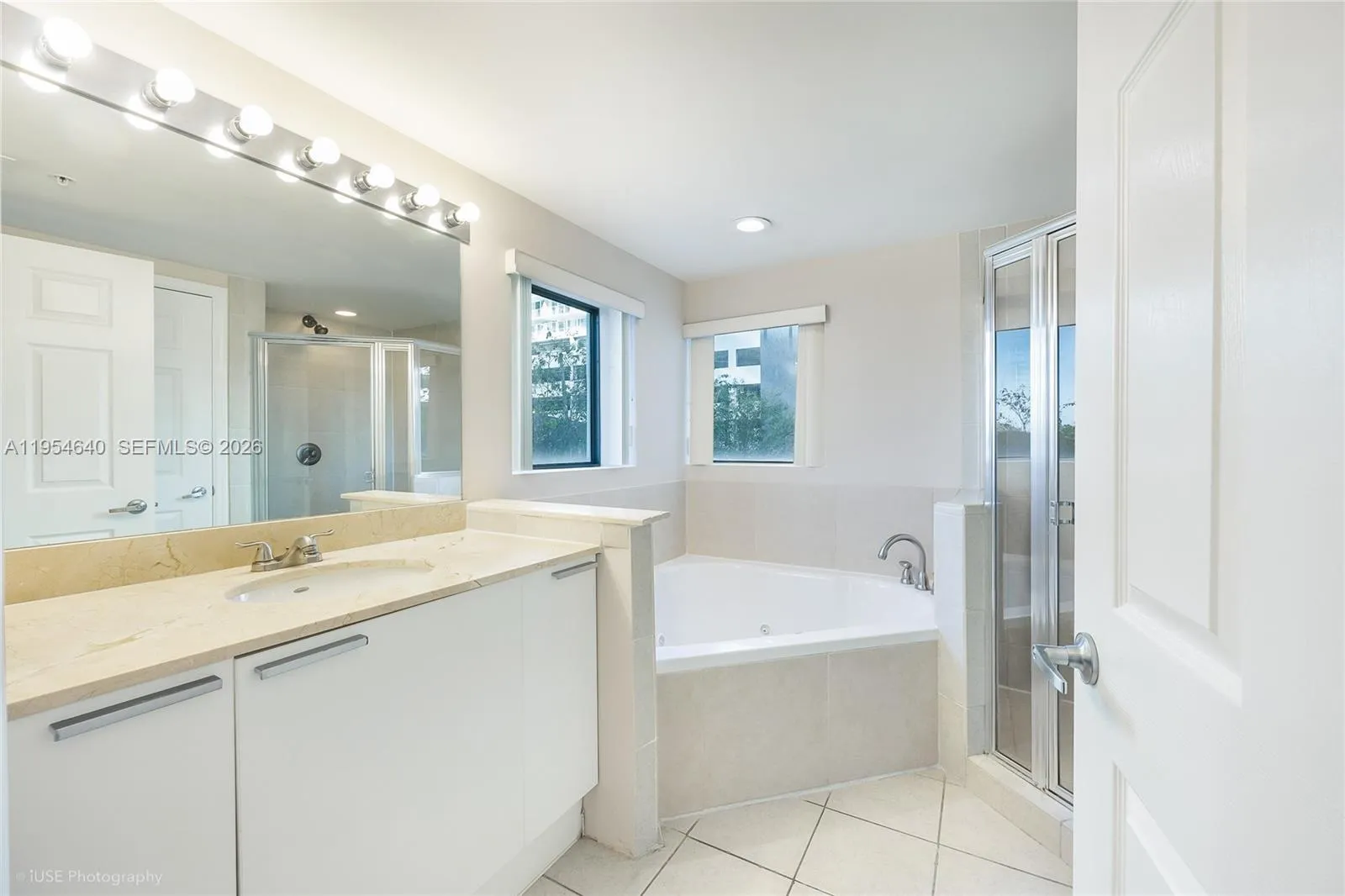 Master bathroom with windows and plenty of light