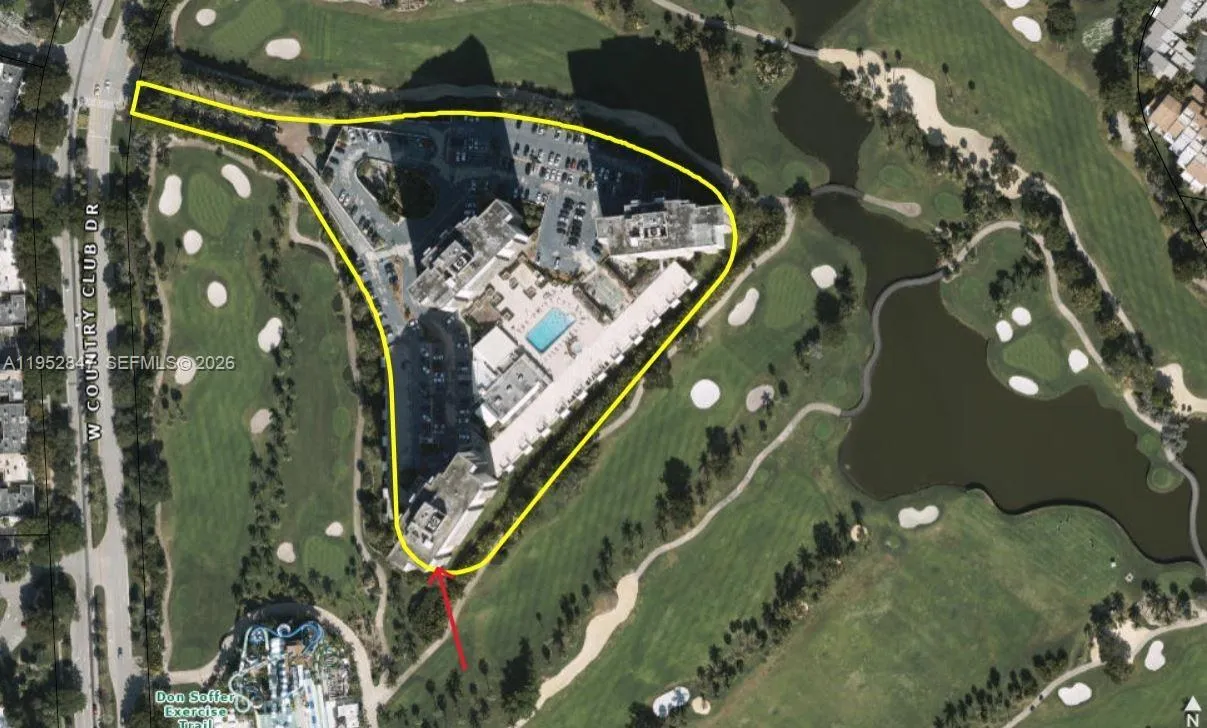 surrounded by golf course