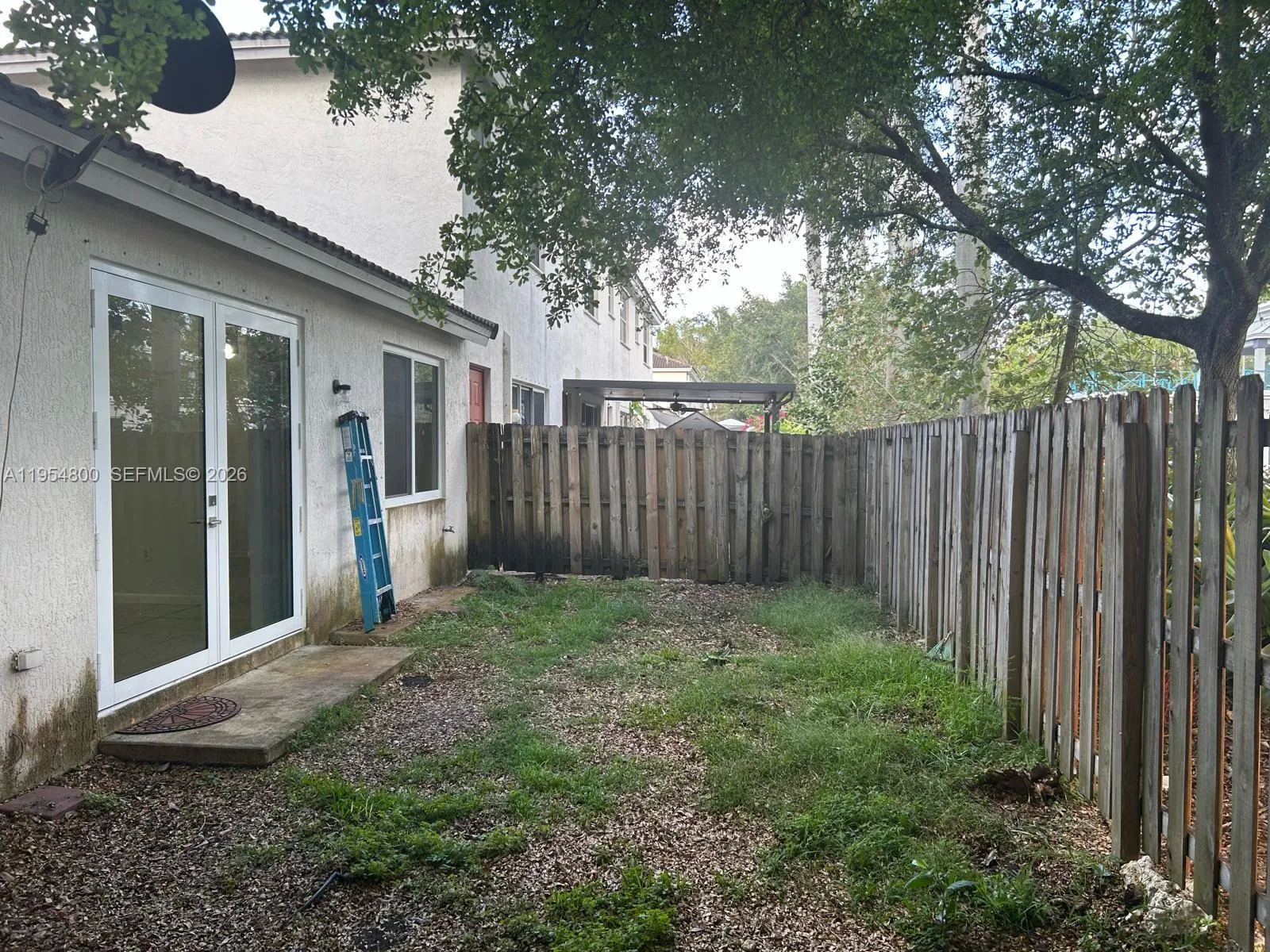 IMPACT DOORS TO BACK YARD