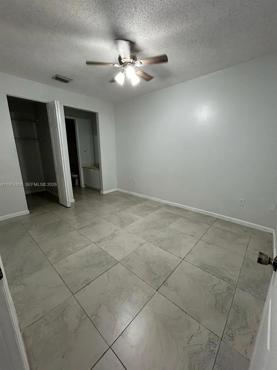 MASTER WITH LOOKING TOWARDS WALK IN AND BATHROOM