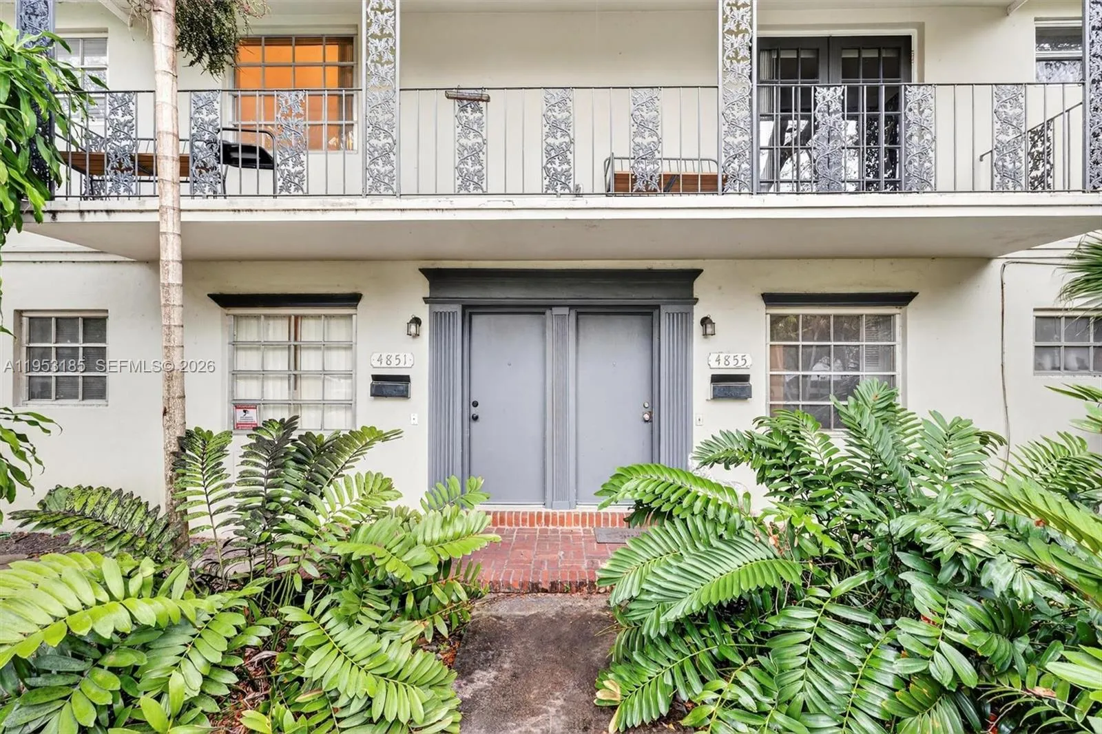 This rare property features two condo units within one structure on an oversized lot, offering exceptional potential for redevelopment into a bespoke luxury residence with dock possibilities.