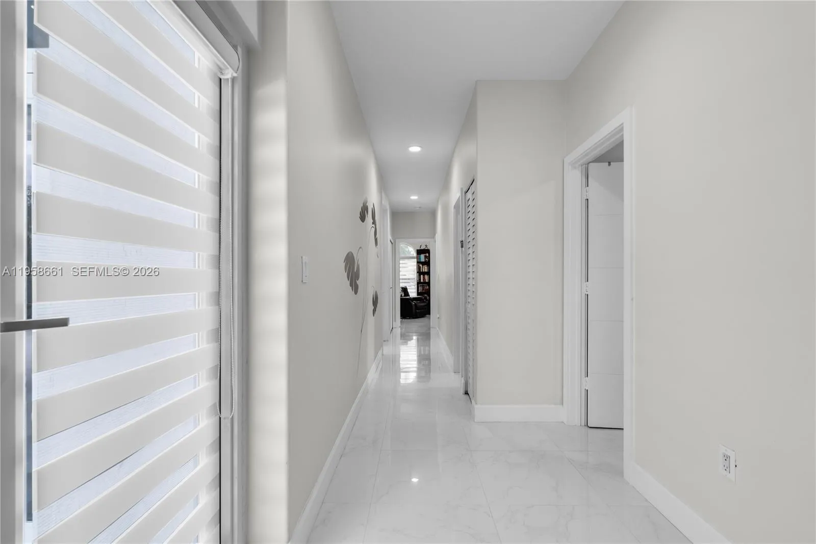 Private bedroom wing features a privacy door, hallway, 4 bedrooms, and 2 bathrooms.